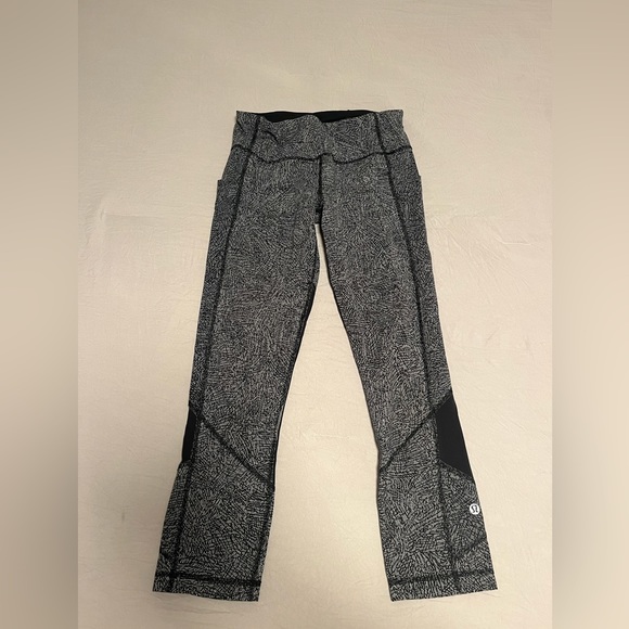lululemon athletica Pants - Lululemon Crop Leggings with pockets and mesh. Size 4. Black and white print.